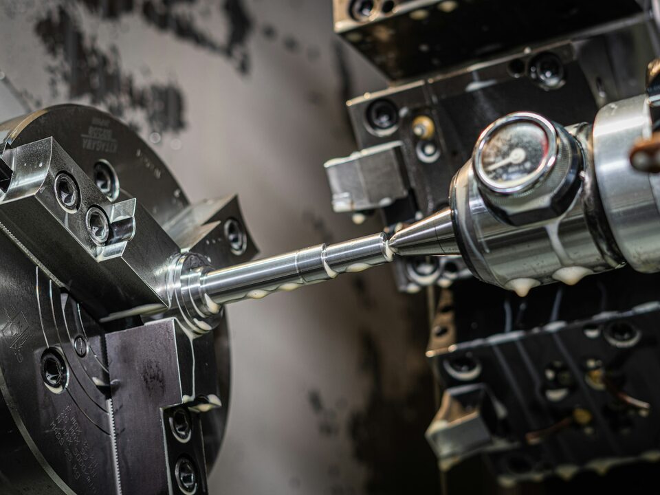 CNC machine on a shop floor, the type of equipment Sigma Insight commonly monitors